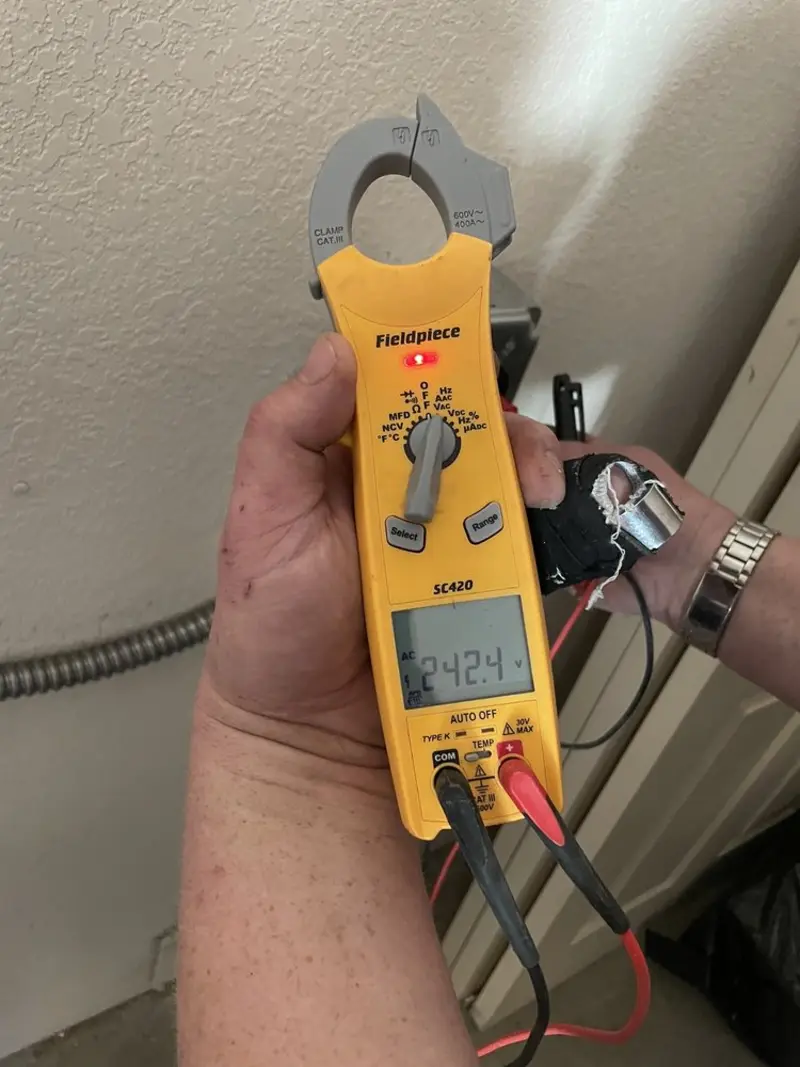 Voltage testing with clamp meter during Generator Installation in Mill Valley